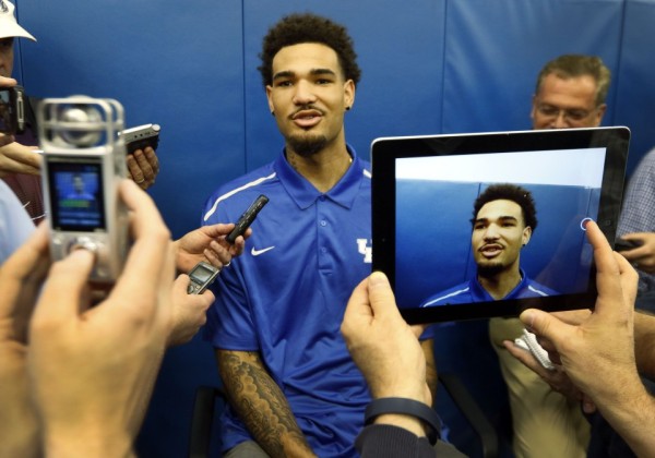 Kentucky NCAA college basketball player Willie Cauley-Stein speaks to reporters after announcing his intent to place his name in the NBA draft during a news conference at the Joe Craft Center, Thursday, April 9, 2015, in Lexington, Ky. (AP Photo/James Crisp)