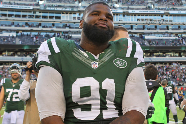 10/20/13 - New England Patriots vs. New York Jets at MetLife Stadium - New York Jets defensive end Sheldon Richardson #91 reacts after the Jets beat the Patriots in overtime.