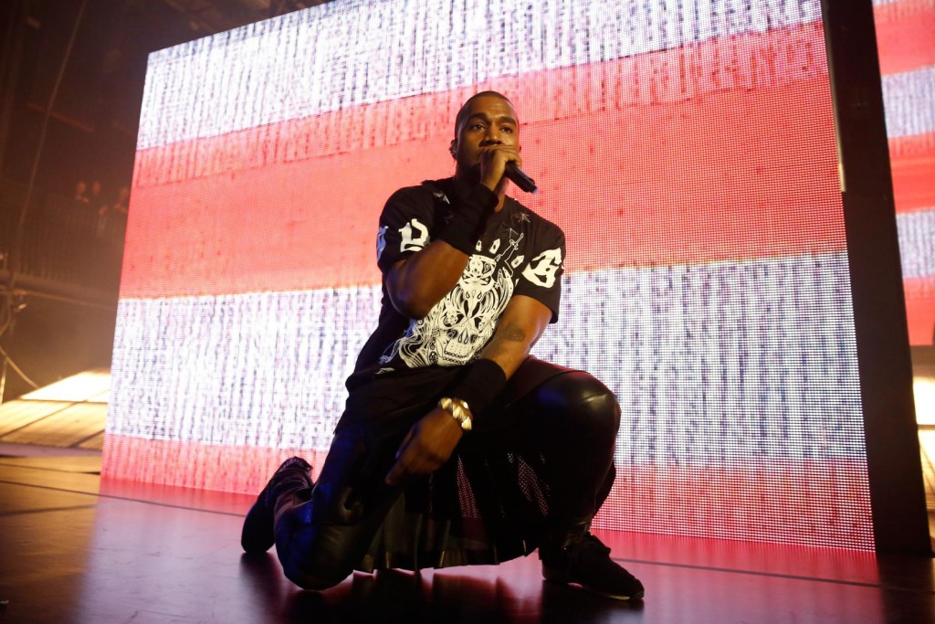 AUSTIN, TX - MARCH 12: Kanye West performs onstage as Samsung Galaxy presents JAY Z and Kanye West at SXSW on March 12, 2014 in Austin, Texas. (Photo by Rick Kern/Getty Images for Samsung)