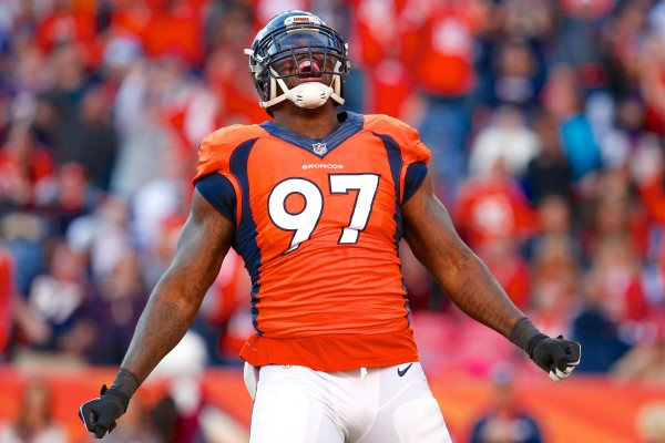 Dec 7, 2014; Denver, CO, USA; Denver Broncos defensive end Malik Jackson (97) reacts after making a sack in the second quarter against the Buffalo Bills at Sports Authority Field at Mile High. Mandatory Credit: Isaiah J. Downing-USA TODAY Sports