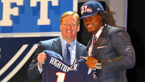 NEW YORK, NY - APRIL 26: Dont'a Hightower of Alabama holds up a jersey as he stands on stage with NFL Commissioner Roger Goodell after he was selected #25 overall by the New England Patriots in the first round of the 2012 NFL Draft at Radio City Music Hall on April 26, 2012 in New York City. (Photo by Al Bello/Getty Images)