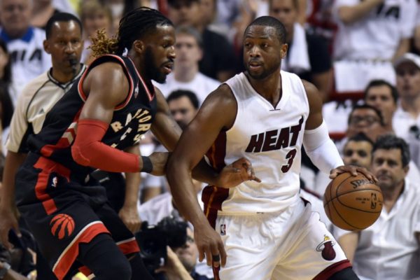 Dwyane Wade & DeMarre Carroll - Steve Mitchell/USA TODAY Sports