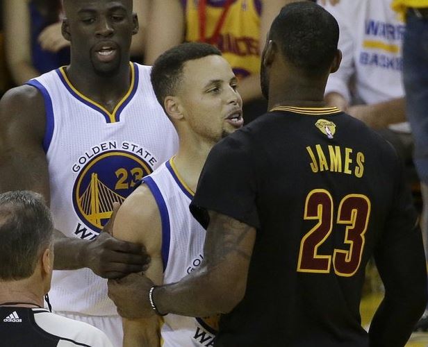 LeBron James stares down Stephen Curry after monster block